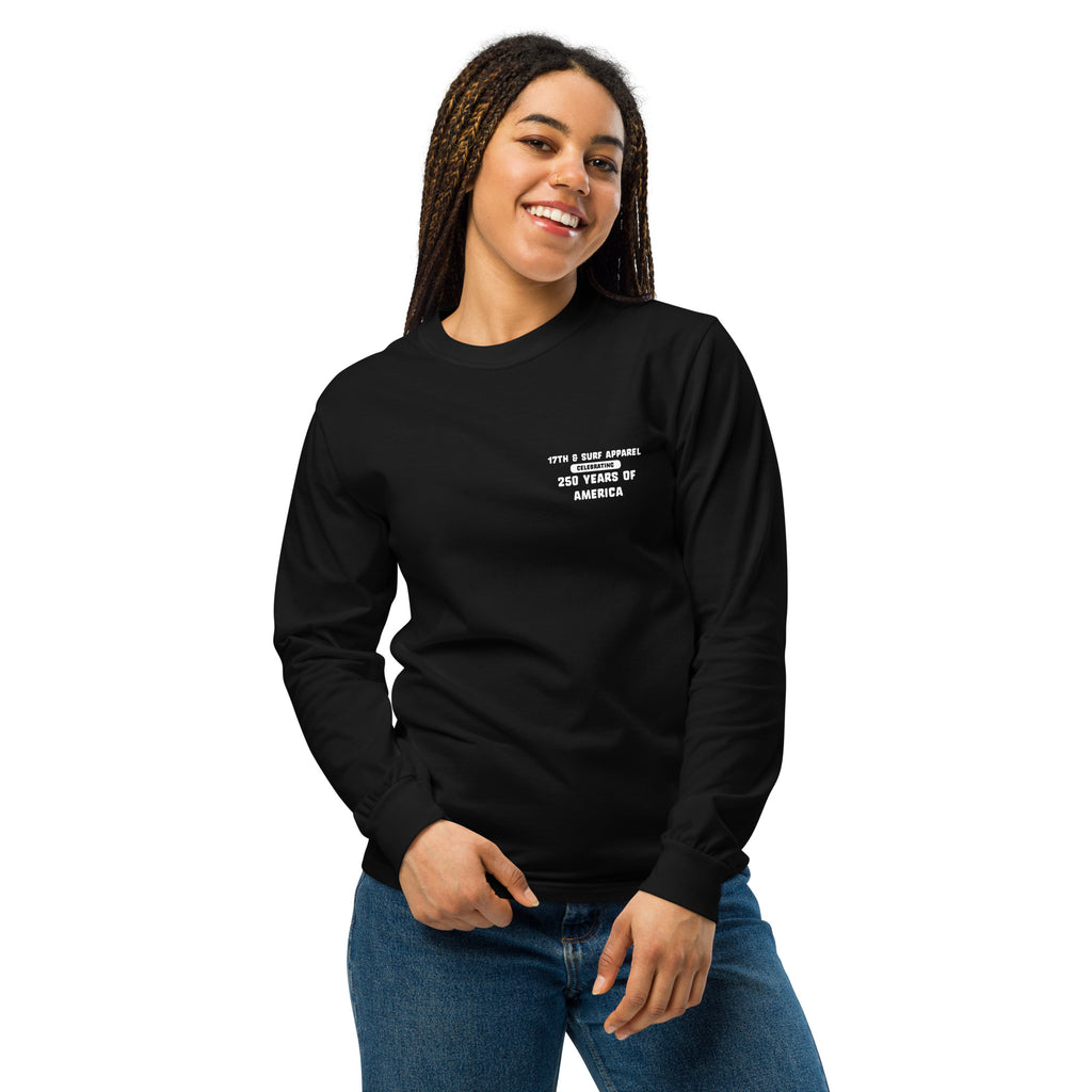 Woman wearing the black "1776 & Surf" long sleeve shirt, front view, featuring the small '17TH & SURF APPAREL Celebrating 250 Years of America' chest wordmark – America's 250th Anniversary Collection by 17th & Surf