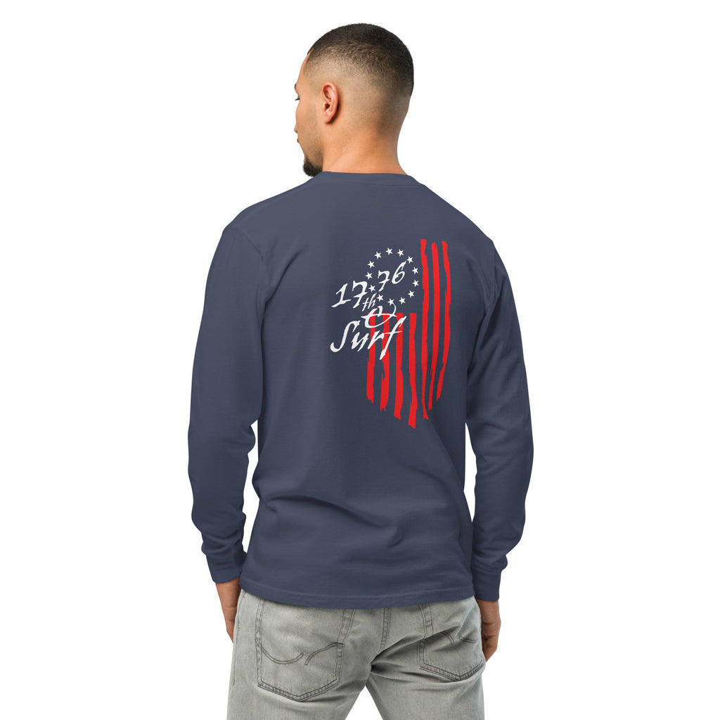 Man wearing the navy "1776 & Surf" long sleeve shirt, back view, featuring the large 1776 script logo with 13-star Betsy Ross flag and distressed red stripe graphic – America's 250th Anniversary Collection by 17th & Surf
