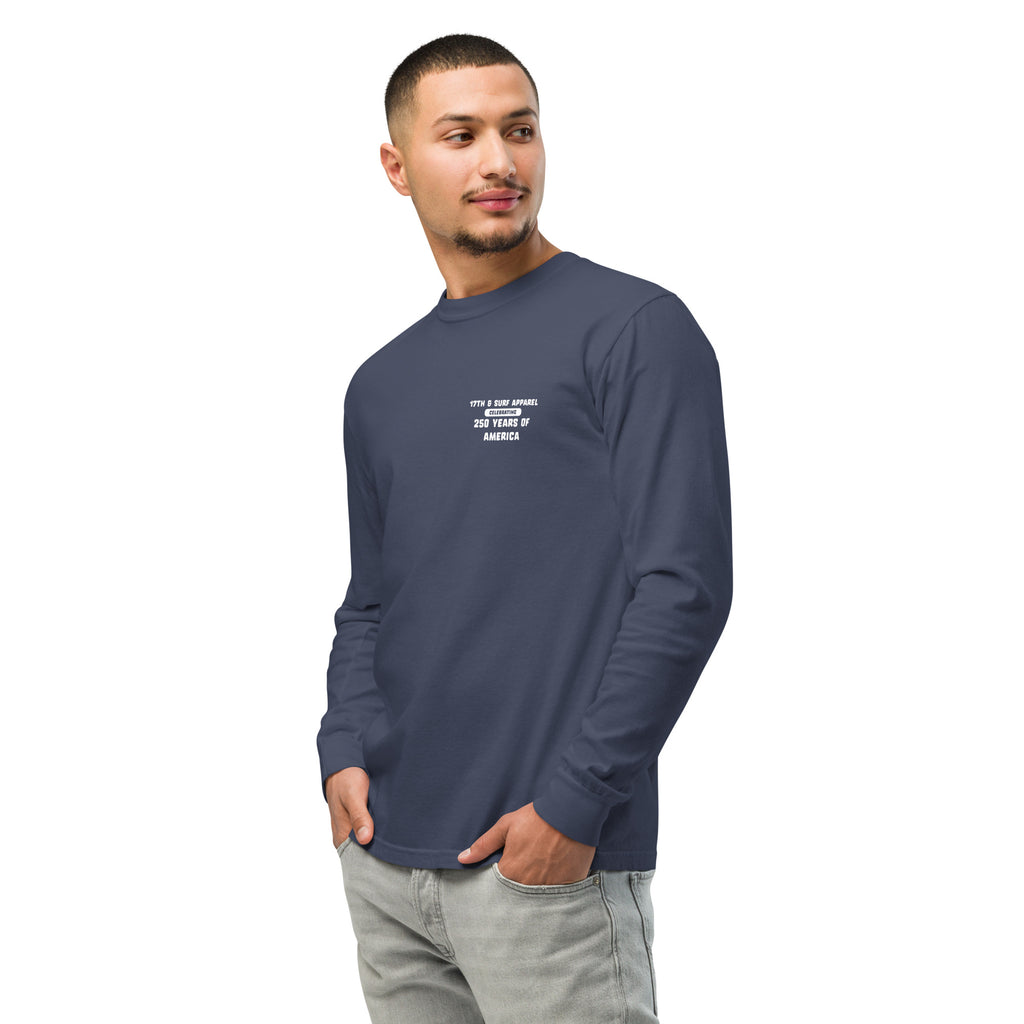 Man wearing the navy "1776 & Surf" long sleeve shirt, angled front view, featuring the small '17TH & SURF APPAREL Celebrating 250 Years of America' chest wordmark – America's 250th Anniversary Collection by 17th & Surf