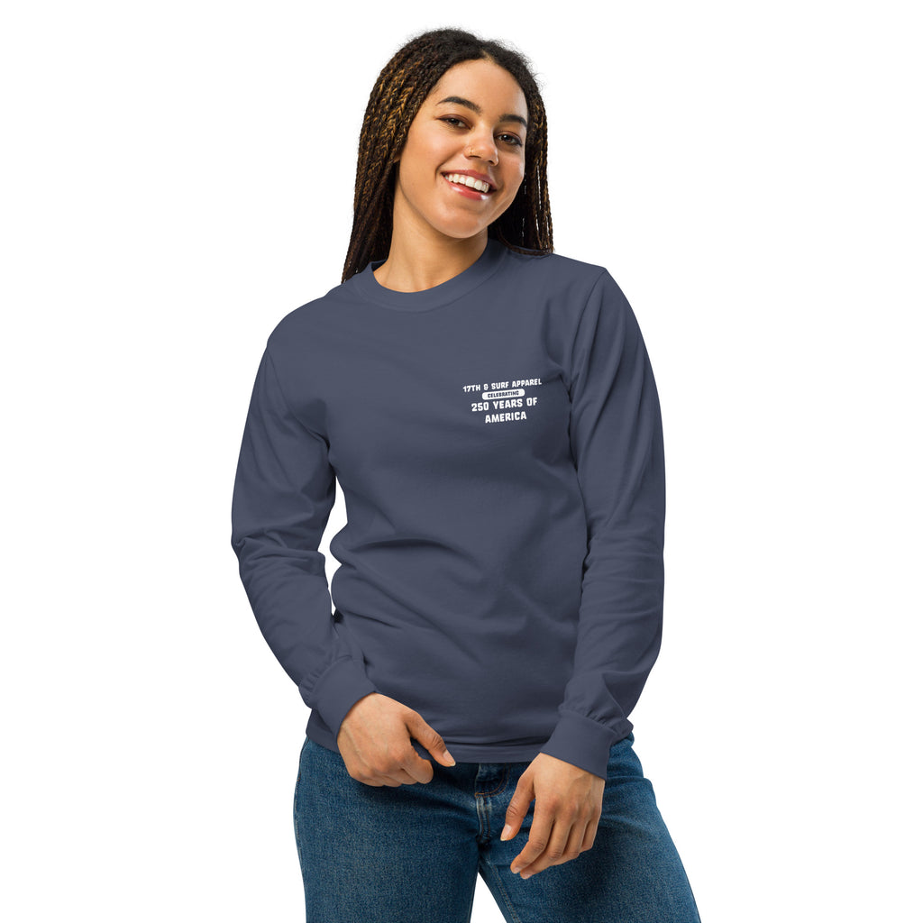 Woman wearing the navy "1776 & Surf" long sleeve shirt, front view, featuring the small '17TH & SURF APPAREL Celebrating 250 Years of America' chest wordmark – America's 250th Anniversary Collection by 17th & Surf