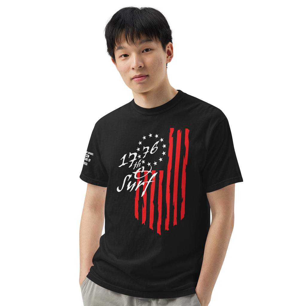 Man wearing the black "1776 & Surf" tee - front print, front view, featuring the large 1776 script logo with 13-star Betsy Ross flag and distressed red stripe graphic – America's 250th Anniversary Collection by 17th & Surf