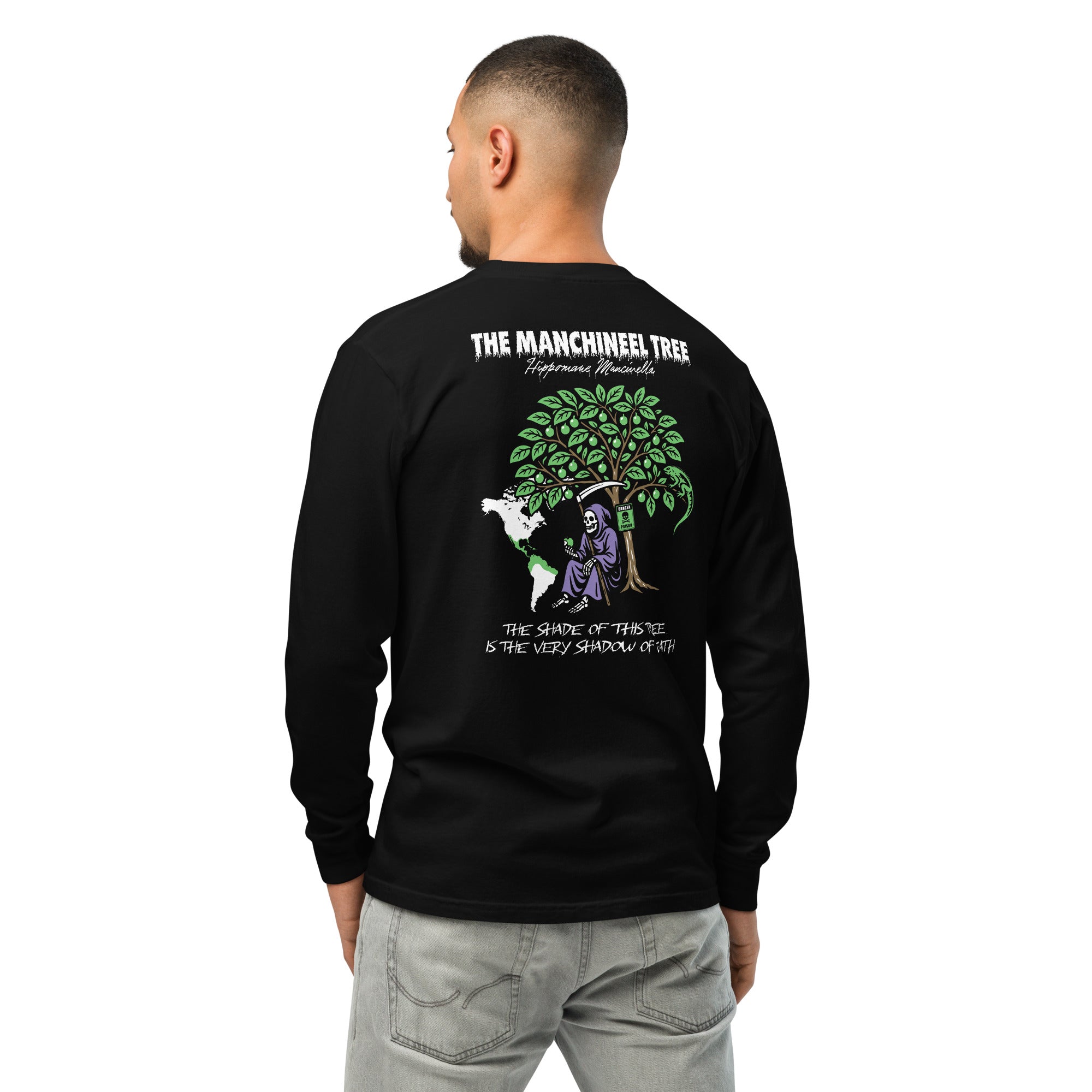 "Beach Apple" garment-dyed heavyweight long sleeve, back view on male model, featuring the large "THE MANCHINEEL TREE" graphic with the Grim Reaper, green iguana, "DANGER POISON" sign, and map of Central/South America – "Beach Apple" Series by 17th & Surf
