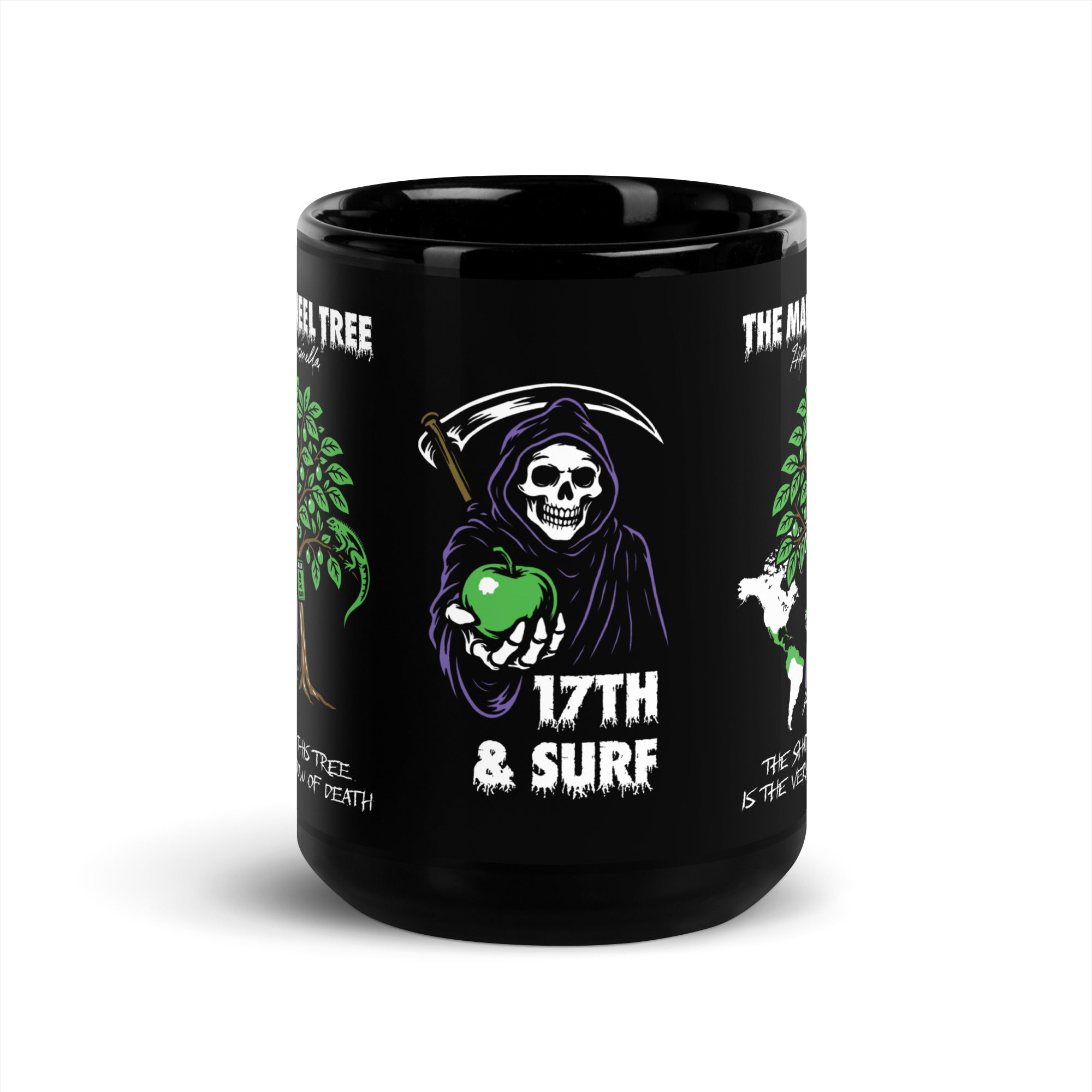 "Beach Apple" black glossy 15oz mug, front view, featuring the small "17th & Surf" Grim Reaper apple logo centered between the wraparound "THE MANCHINEEL TREE" graphic panels – "Beach Apple" Series by 17th & Surf