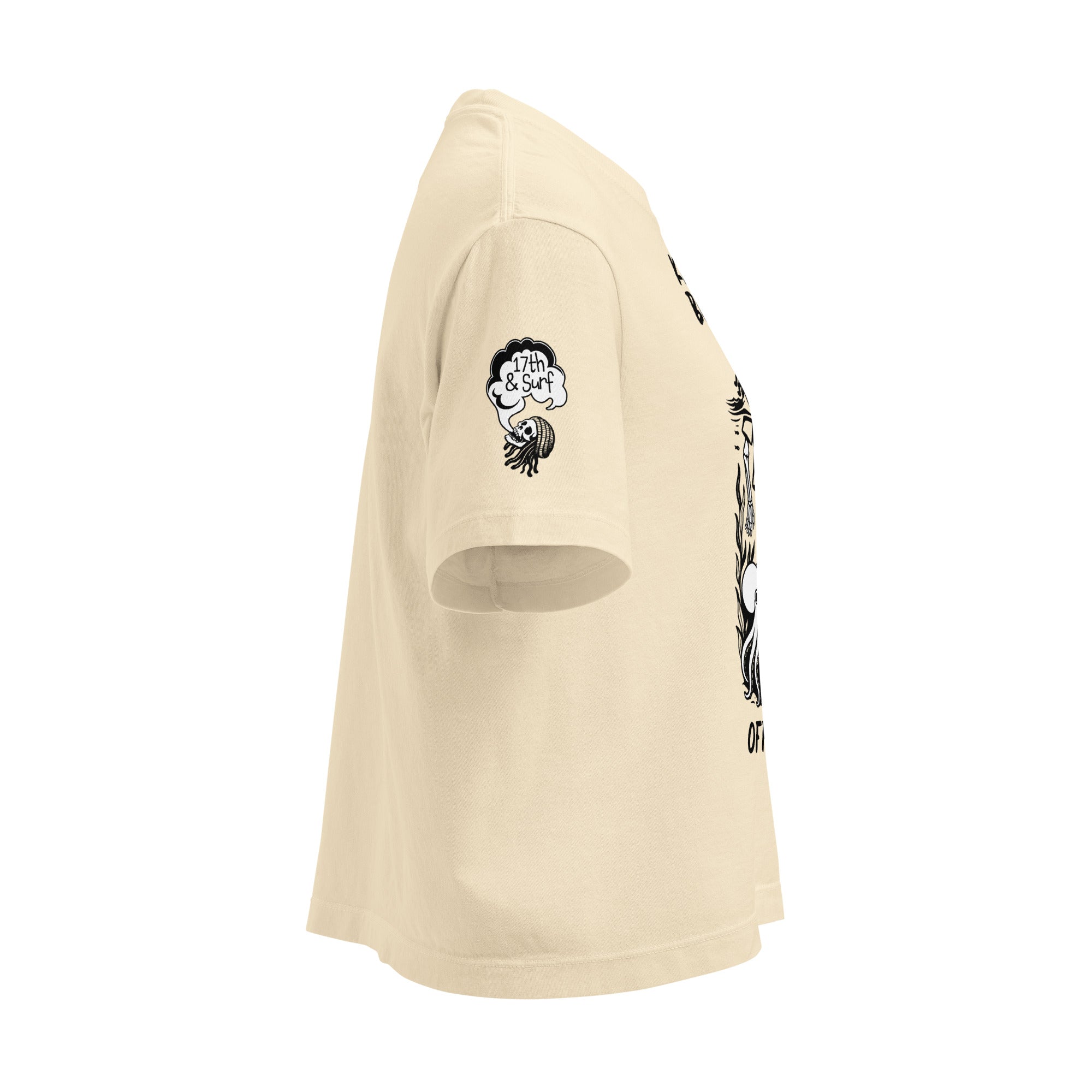 "Keep Your Butts Off The Beach" women's heavyweight boxy tee right angle in ivory showing small smoking-skull sleeve logo with "17th & Surf" cloud - 17th & Surf