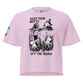 "Keep Your Butts Off The Beach" women's heavyweight boxy tee front view in orchid pink featuring skeleton lighting a cigarette for a puffin with octopuses in seaweed graphic and small smoking-skull sleeve logo - 17th & Surf