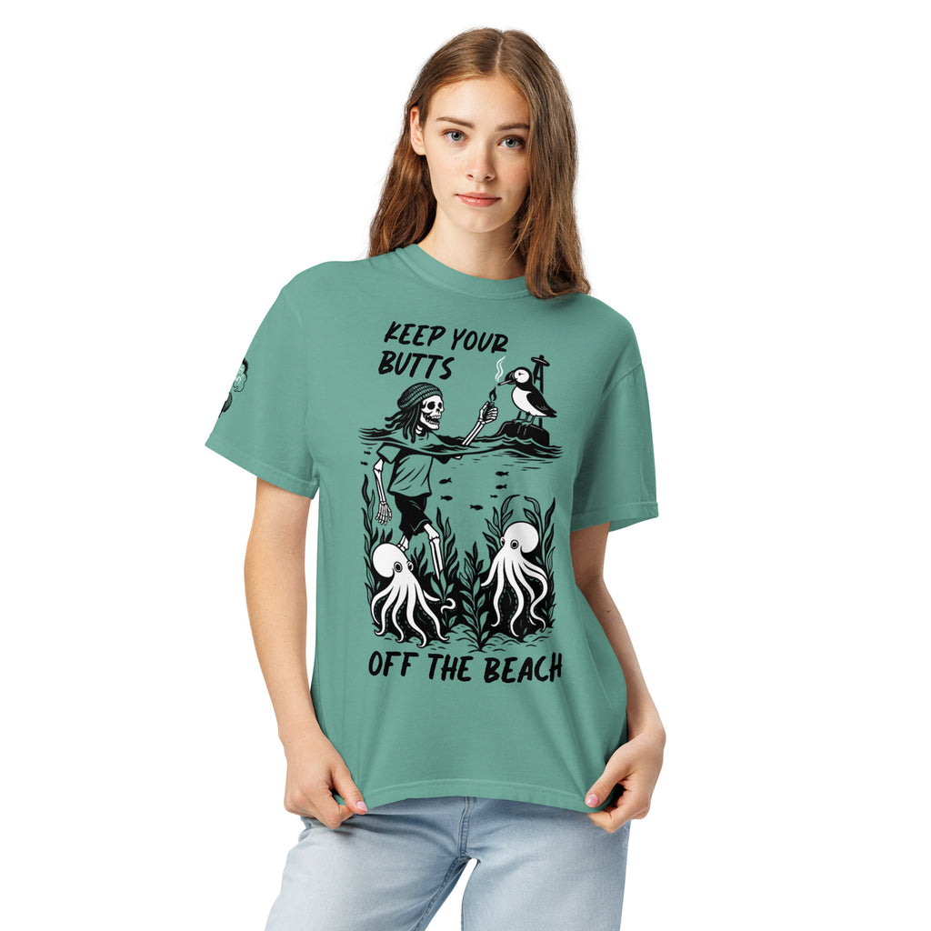 "Keep Your Butts Off The Beach" front print garment-dyed heavyweight tee second front view in seafoam featuring skeleton lighting a cigarette for a puffin with octopuses in seaweed graphic - 17th & Surf