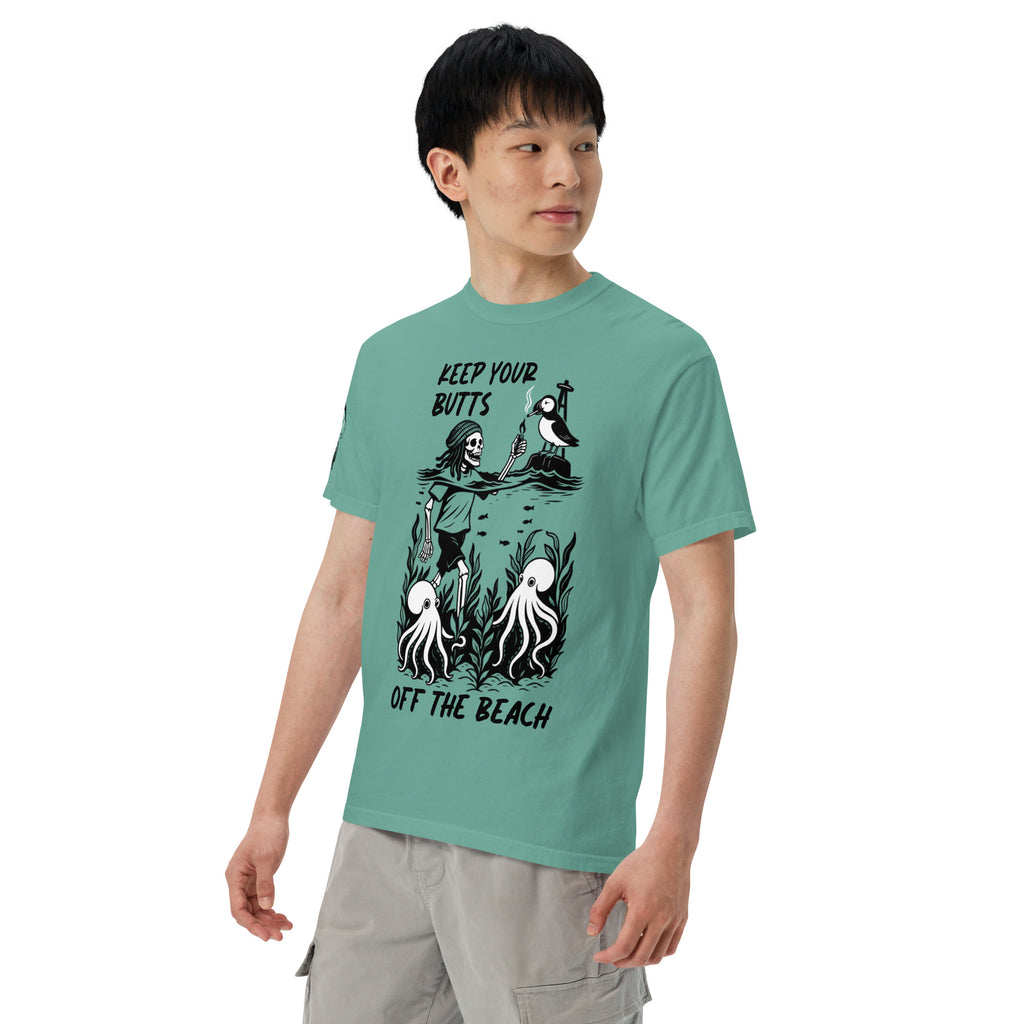 "Keep Your Butts Off The Beach" front print garment-dyed heavyweight tee left front angle in seafoam showing skeleton lighting a cigarette for a puffin with octopuses in seaweed graphic - 17th & Surf