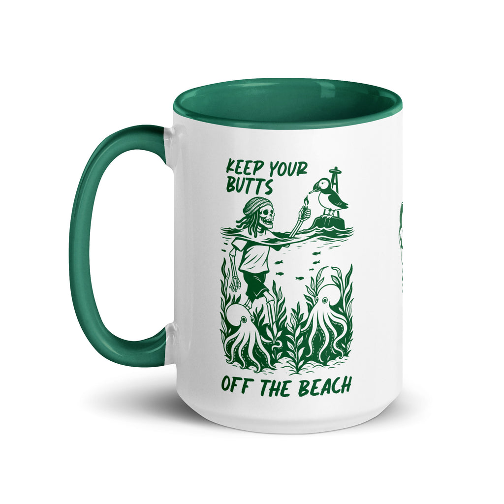 "Keep Your Butts Off The Beach" white ceramic 15oz mug with dark green interior and handle, left view, featuring skeleton lighting a cigarette for a puffin with octopuses in seaweed graphic - 17th & Surf