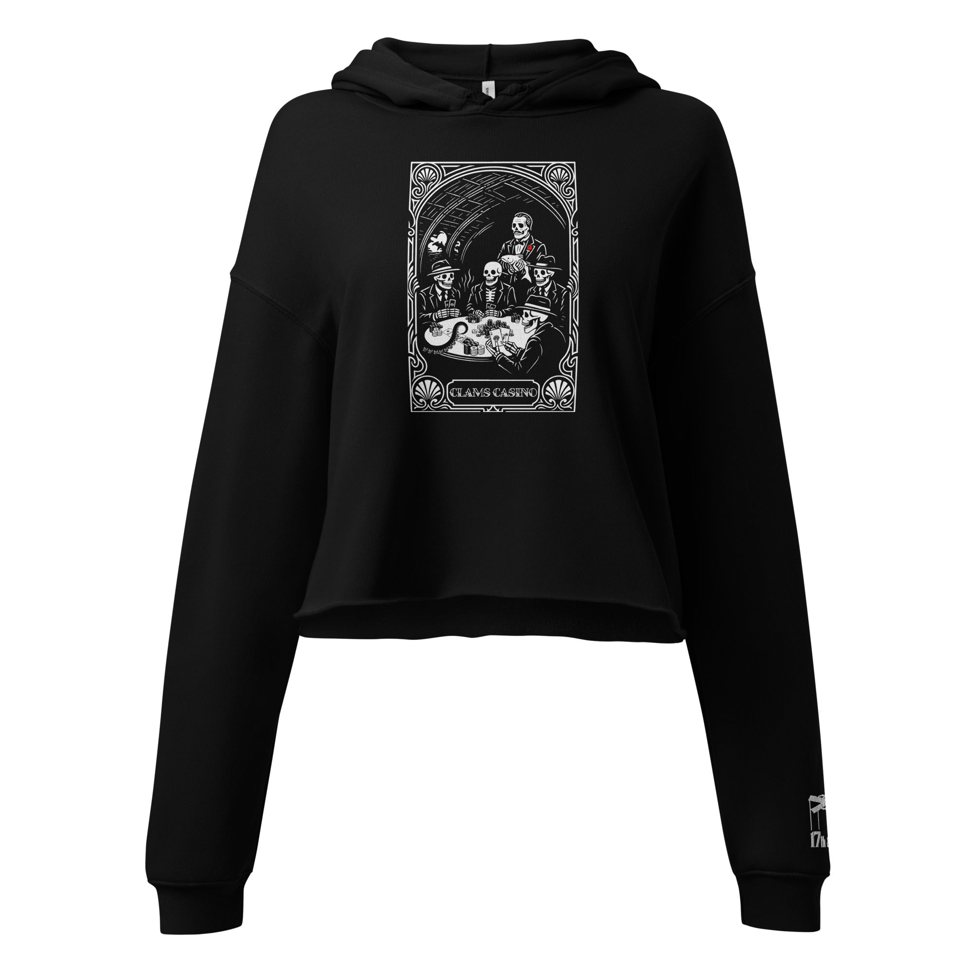 Woman wearing the "Clam's Casino" cropped hoodie in black, front view, featuring the large art nouveau "CLAMS CASINO" poker scene with skeleton mobsters, a tuxedo-clad Don holding a catfish, and an octopus tentacle reaching across the table – Clam's Casino Series by 17th & Surf