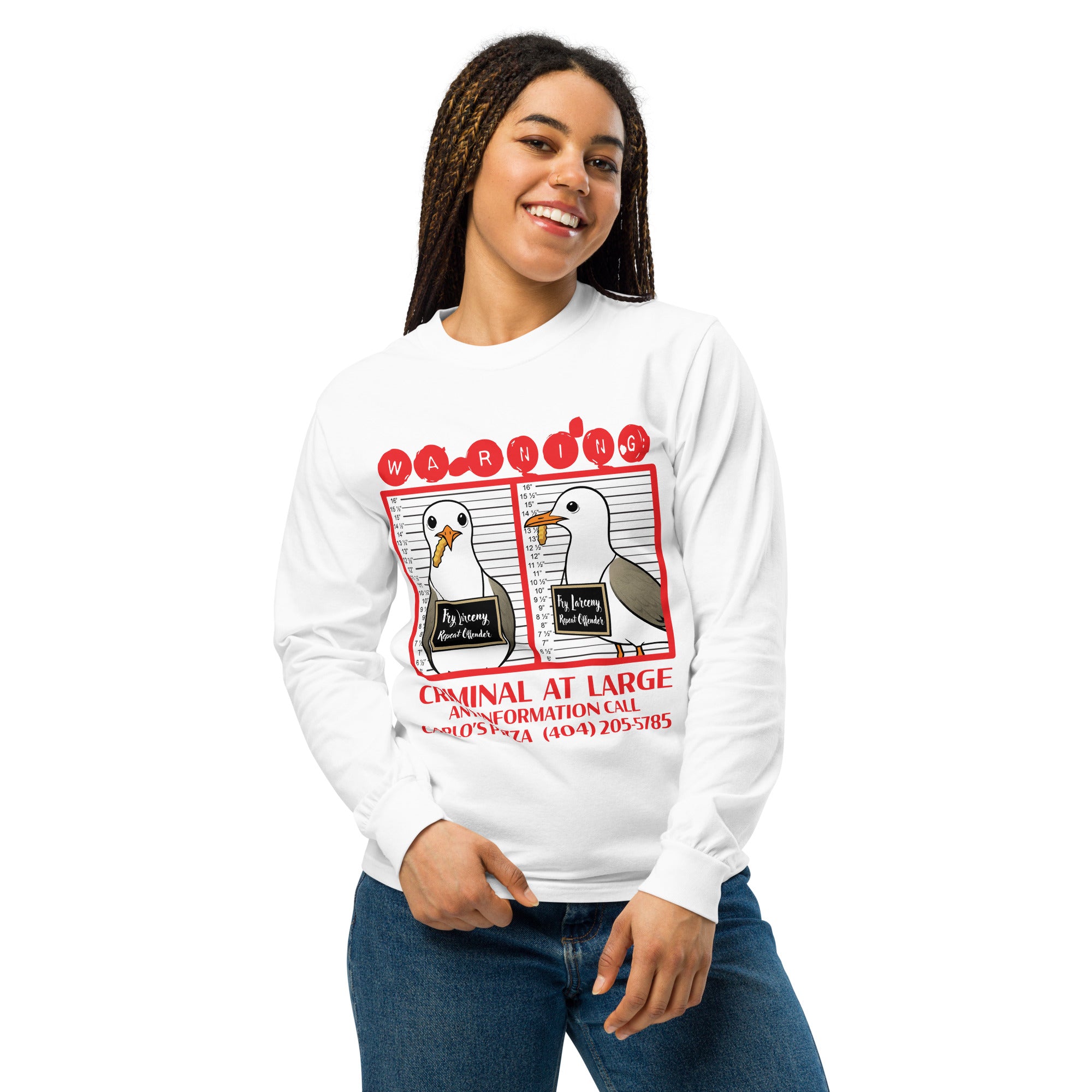 "Criminal At Large" white long sleeve tee on female model, front view, featuring seagull "WARNING" mugshot graphic with "Fry Larceny, Repeat Offender" police lineup – 17th & Surf x Carlo's Pizza