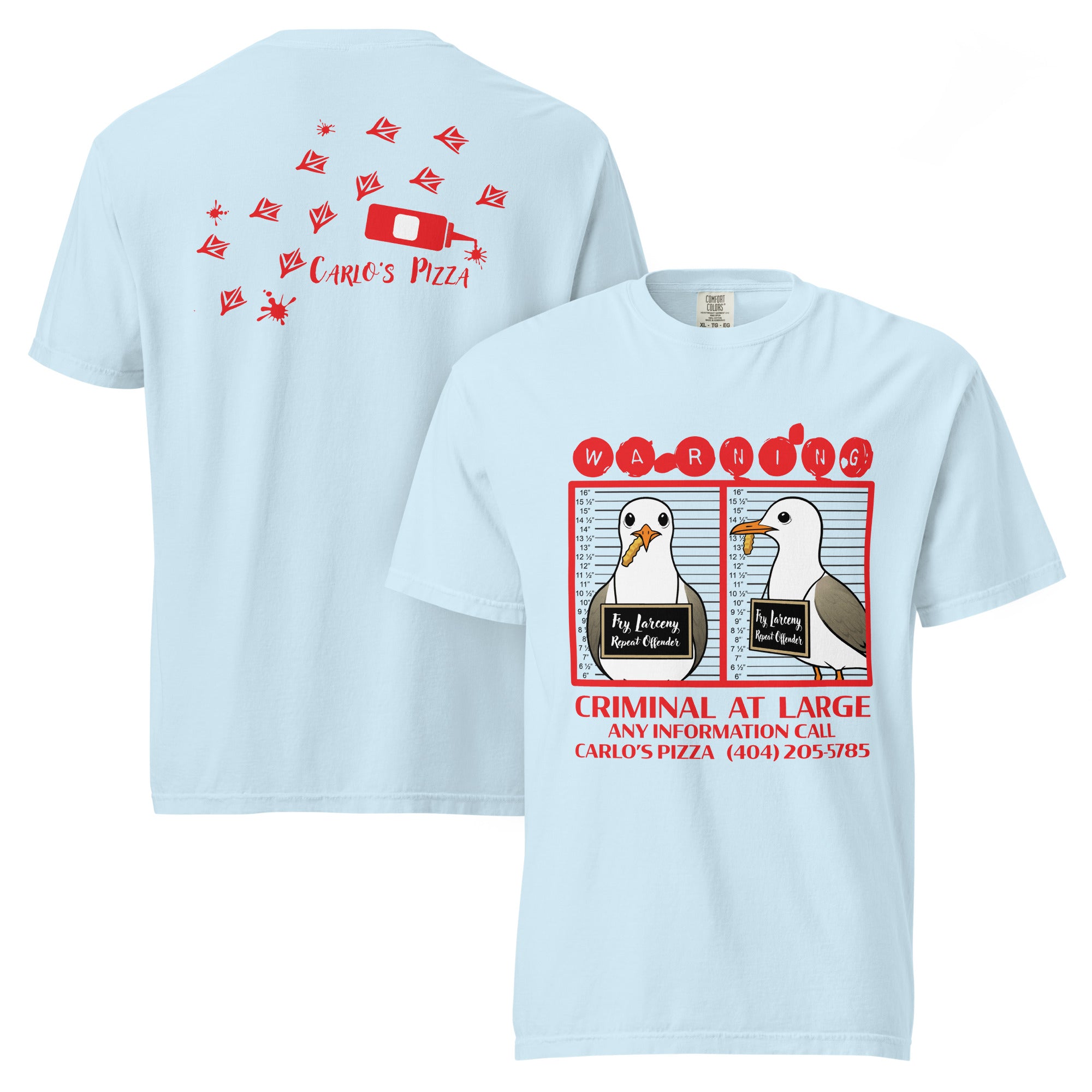 "Criminal At Large" light blue garment-dyed heavyweight tee, front and back flat lay, featuring seagull "WARNING" mugshot graphic on front and Carlo's Pizza footprint design on back – 17th & Surf x Carlo's Pizza