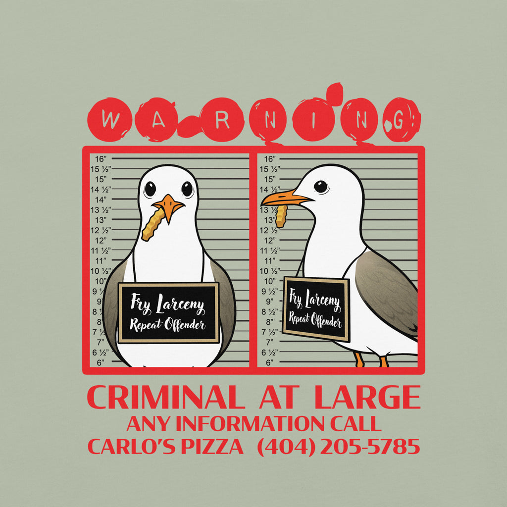 "Criminal At Large" sage green garment-dyed heavyweight tee, front flat lay, featuring seagull "WARNING" mugshot graphic with "Fry Larceny, Repeat Offender" police lineup – 17th & Surf x Carlo's Pizza