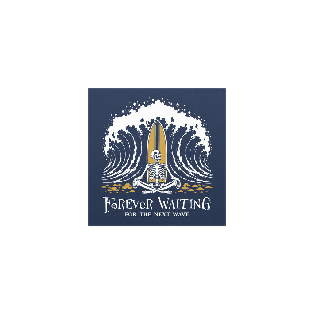 "Forever Waiting For The Next Wave" car magnet, front view, featuring a meditating skeleton surfer, board planted upright behind him, sitting cross-legged on the shore as breakers roll in on either side – 17th & Surf