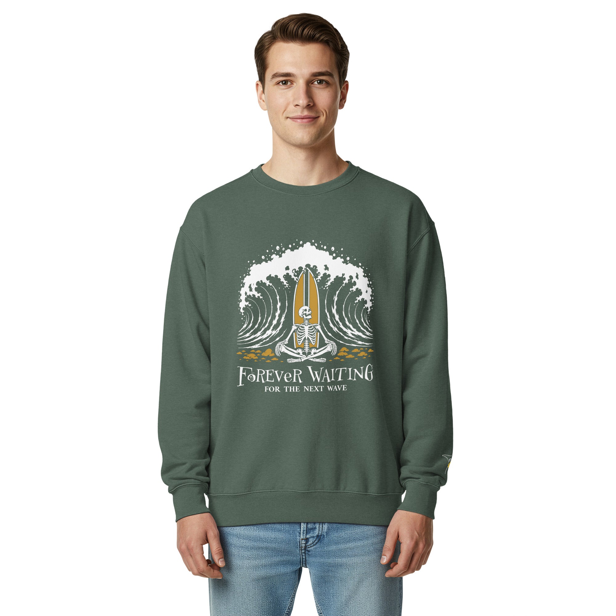 "Forever Waiting For The Next Wave" crewneck sweatshirt, Blue Spruce, second front view, featuring a meditating skeleton surfer, board planted upright behind him, sitting cross-legged on the shore as breakers roll in on either side – 17th & Surf