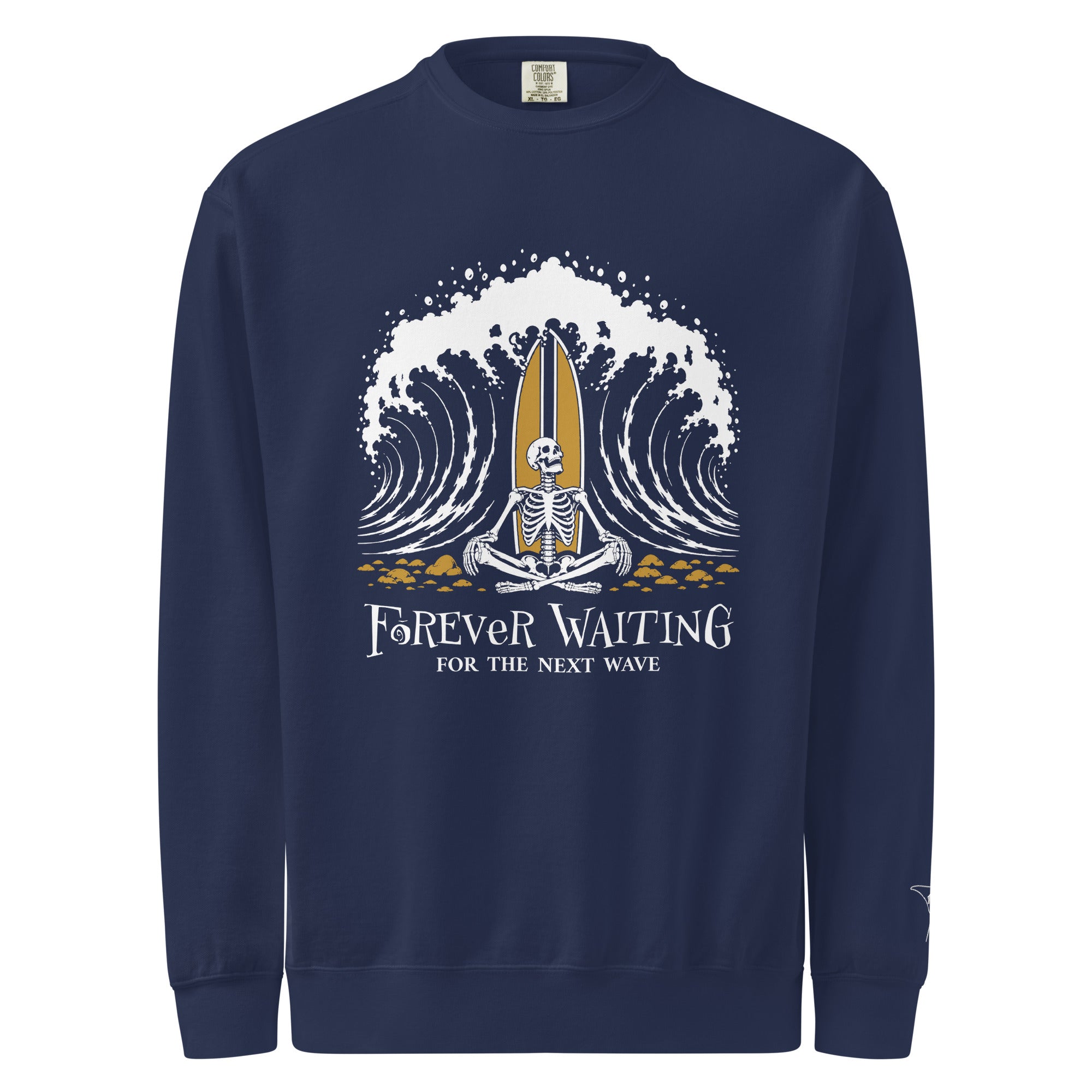 "Forever Waiting For The Next Wave" crewneck sweatshirt, True Navy, front view, featuring a meditating skeleton surfer, board planted upright behind him, sitting cross-legged on the shore as breakers roll in on either side – 17th & Surf