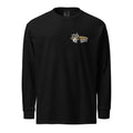 "Forever Waiting For The Next Wave" long sleeve shirt, Black, front view, featuring a meditating skeleton surfer, board planted upright behind him, sitting cross-legged on the shore as breakers roll in on either side – 17th & Surf
