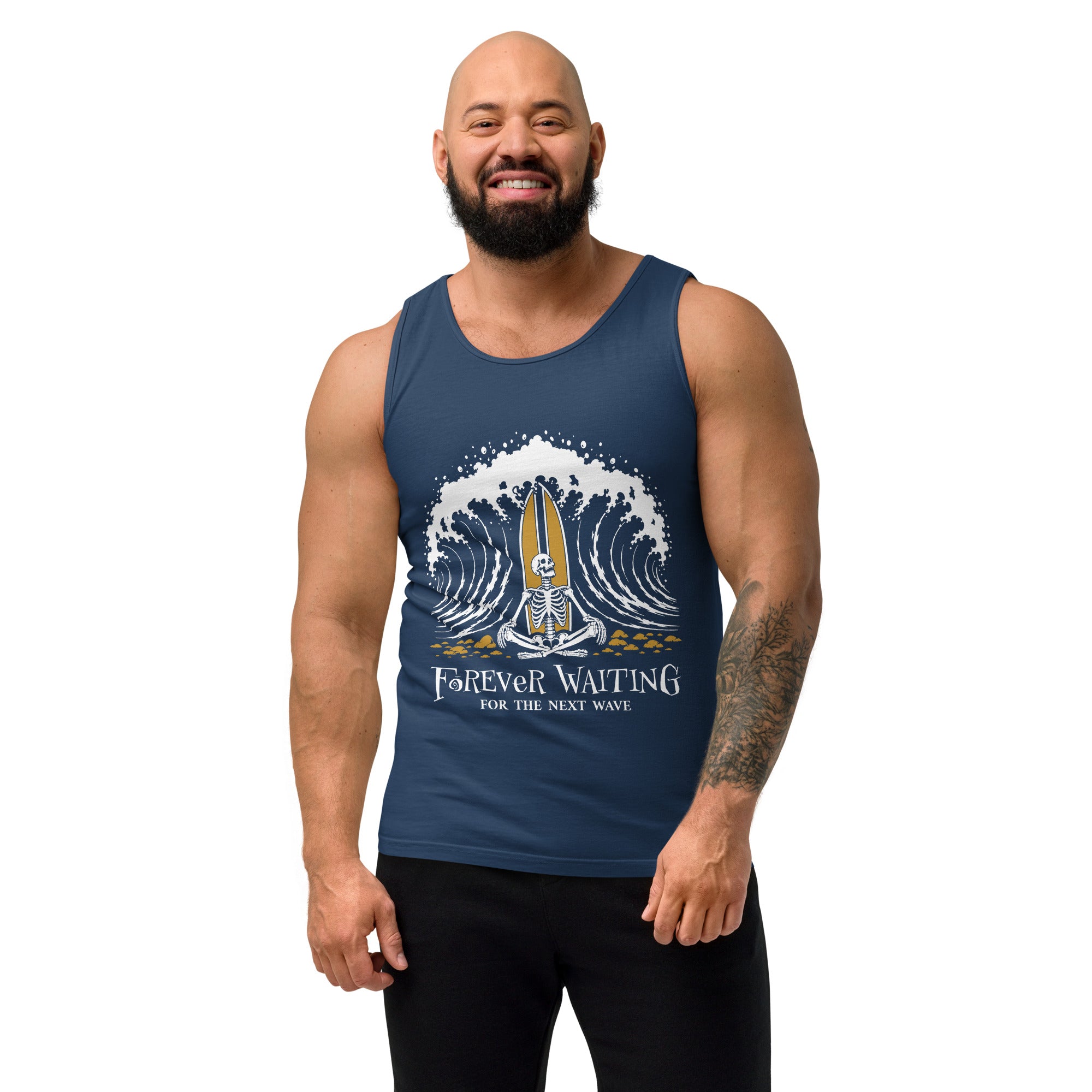"Forever Waiting For The Next Wave" tank top, True Navy, second front view, featuring a meditating skeleton surfer, board planted upright behind him, sitting cross-legged on the shore as breakers roll in on either side – 17th & Surf
