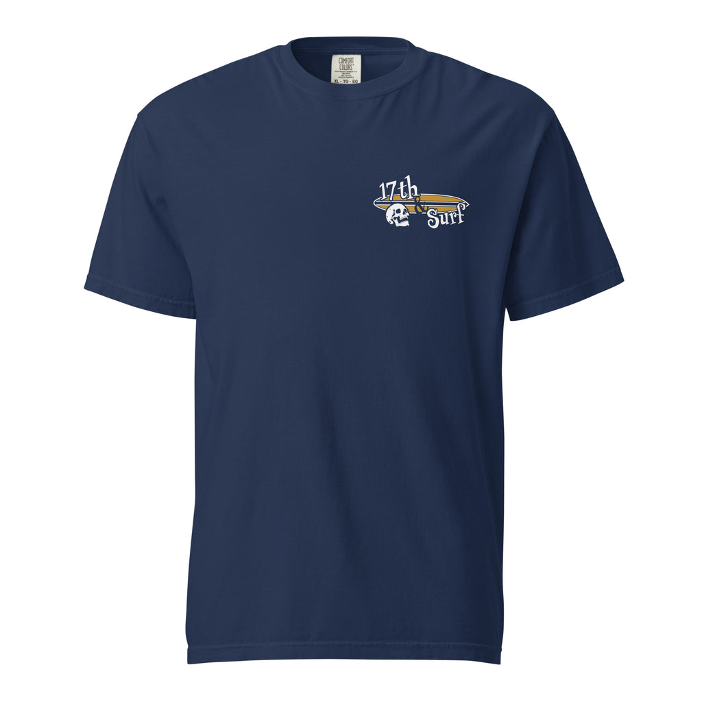 "Forever Waiting For The Next Wave" tee, True Navy, front view, featuring a meditating skeleton surfer, board planted upright behind him, sitting cross-legged on the shore as breakers roll in on either side – 17th & Surf
