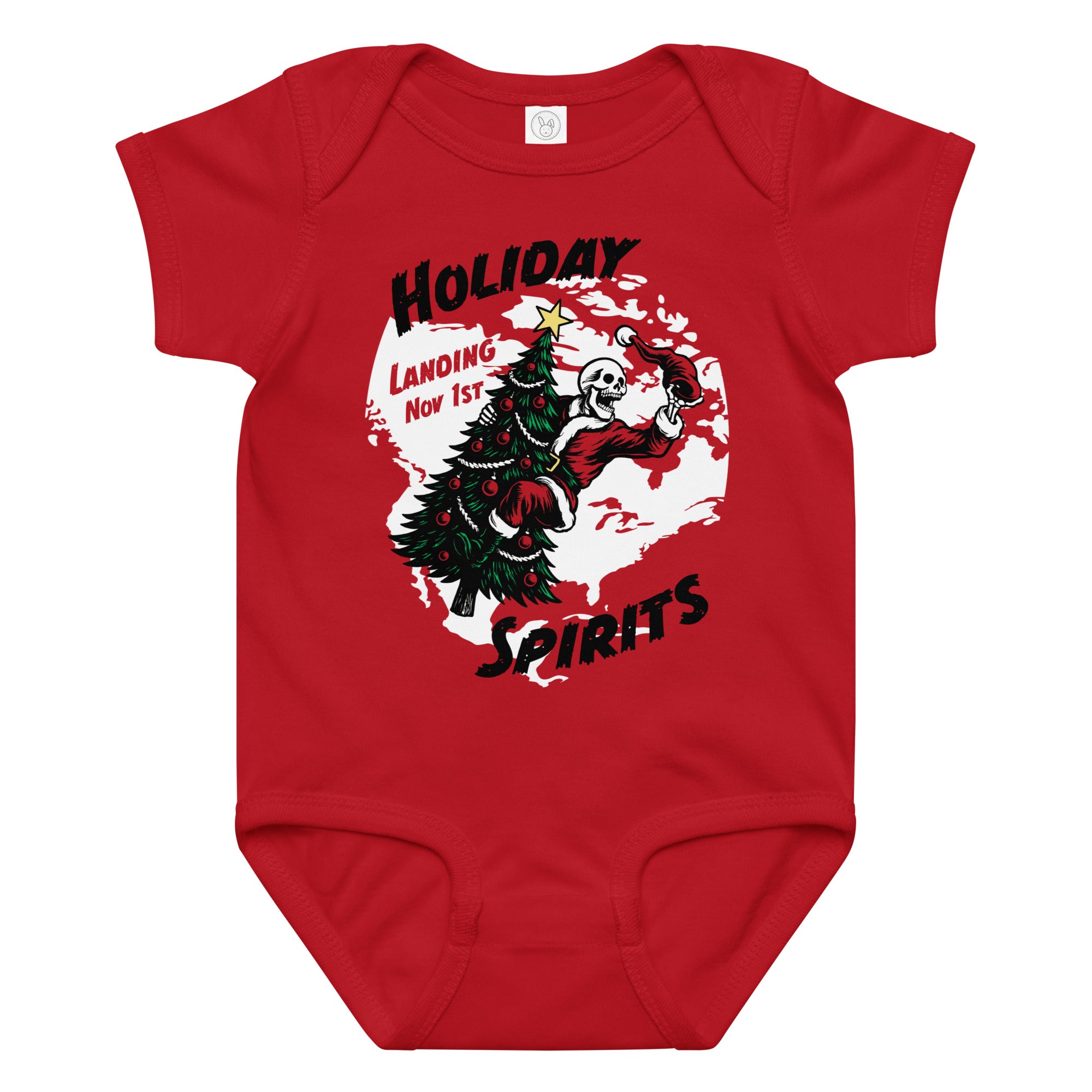 "Holiday Spirits" baby short sleeve onesie in red, front view featuring full color graphic of a skeleton Santa riding a decorated Christmas tree inside a white splatter map shape with arched "Holiday" and "Spirits" text and "Landing Nov 1st" – 17th & Surf