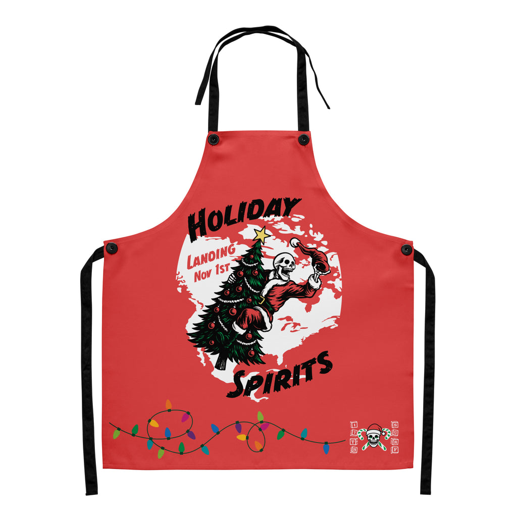 Model wearing "Holiday Spirits" chef apron in white featuring full color graphic of a skeleton Santa riding a decorated Christmas tree inside a white splatter map shape with arched "Holiday" and "Spirits" text, a string of colorful Christmas lights along the hem, and small "17th & Surf" candy cane crossbones skull logo – 17th & Surf