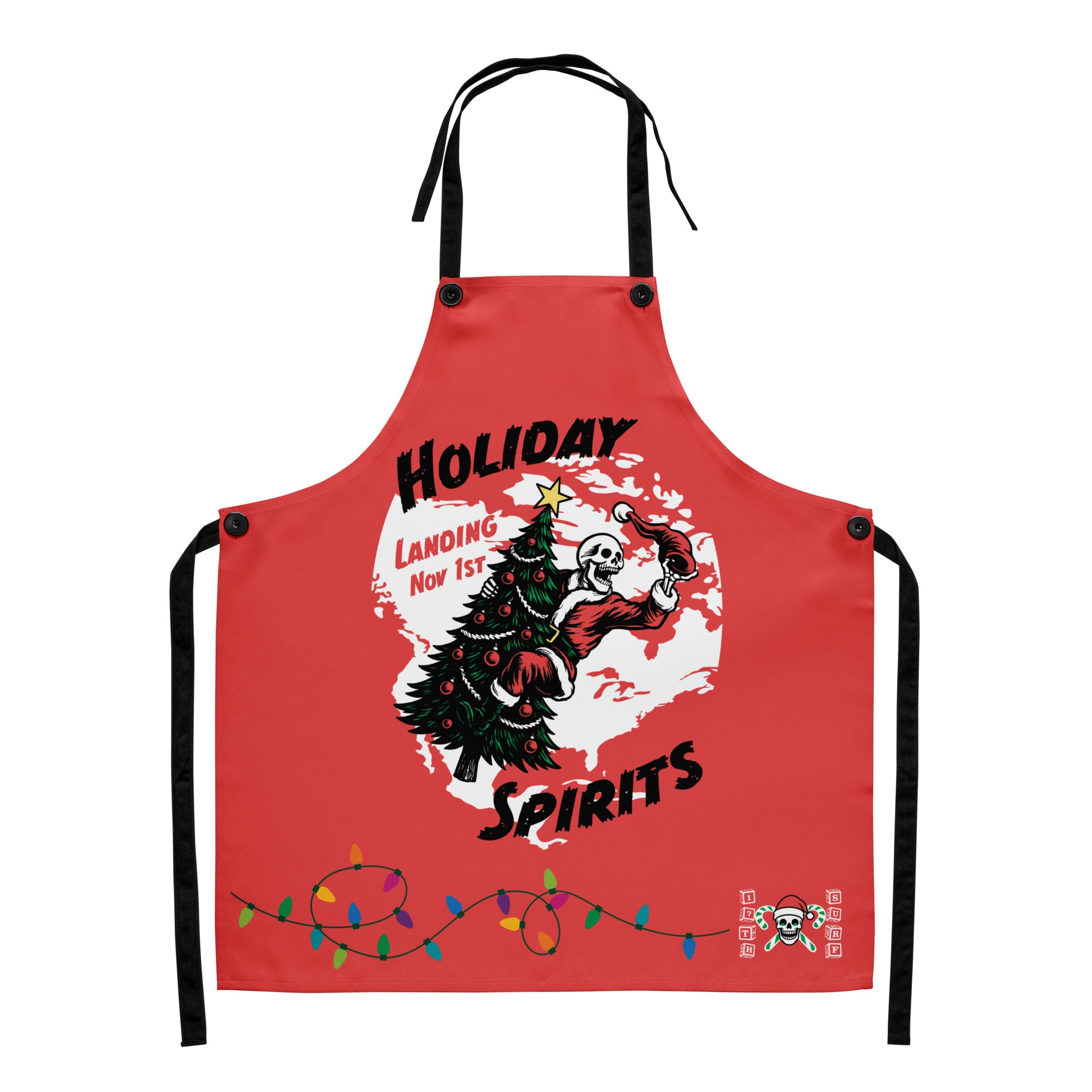 Model wearing "Holiday Spirits" chef apron in white featuring full color graphic of a skeleton Santa riding a decorated Christmas tree inside a white splatter map shape with arched "Holiday" and "Spirits" text, a string of colorful Christmas lights along the hem, and small "17th & Surf" candy cane crossbones skull logo – 17th & Surf