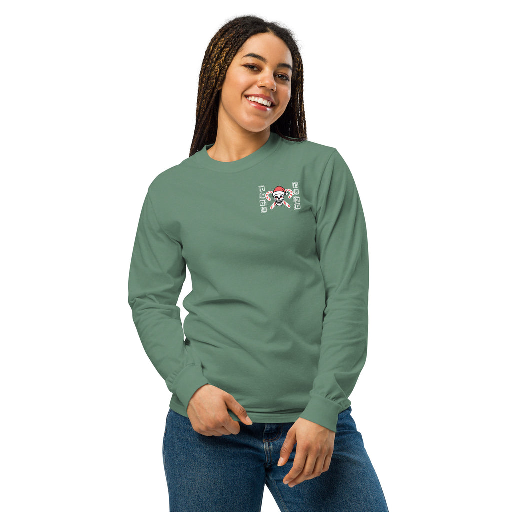 Model wearing "Holiday Spirits" garment-dyed heavyweight long sleeve shirt in sage green with small "17th & Surf" candy cane crossbones skull chest logo, front view – 17th & Surf