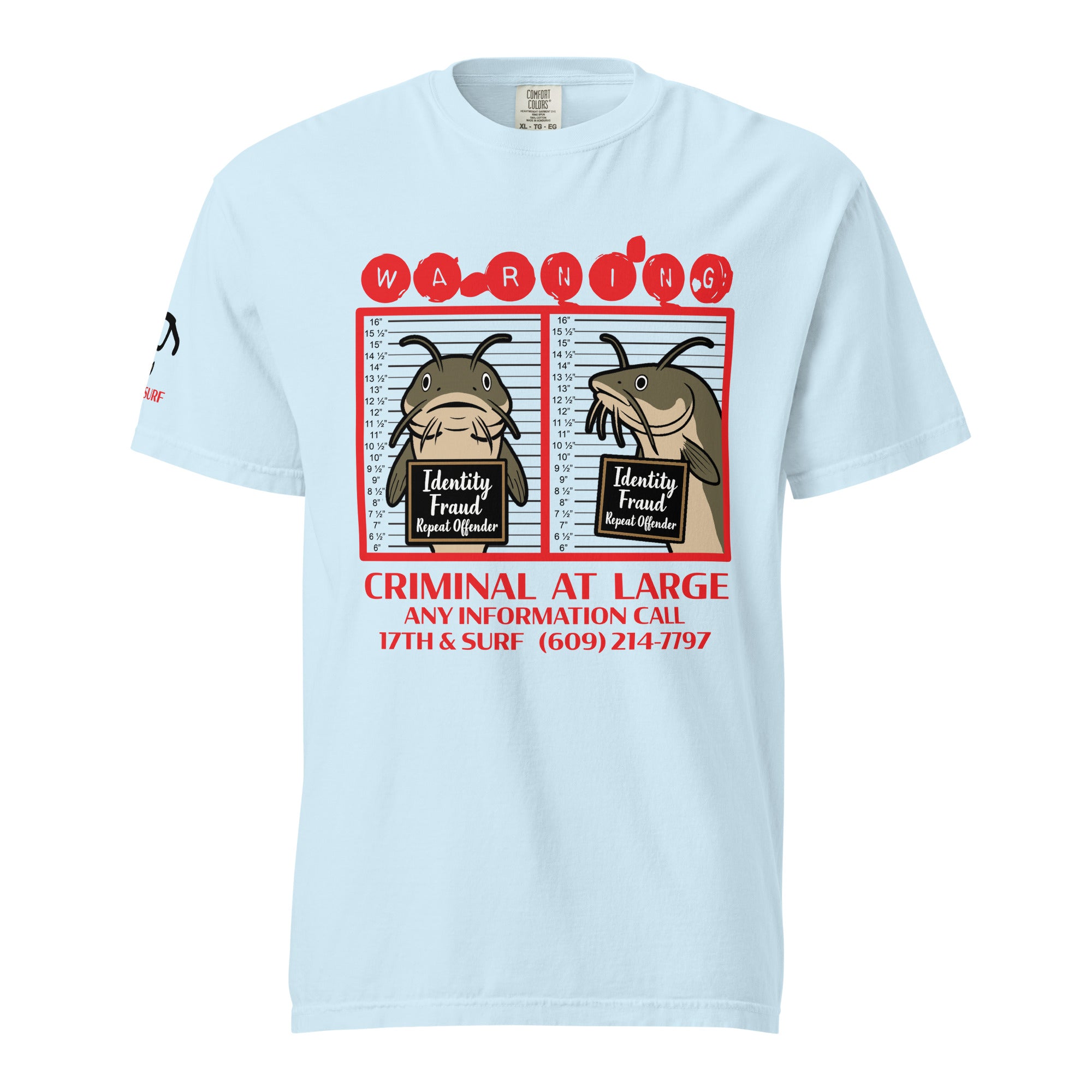 "Identity Fraud" chambray garment-dyed heavyweight tee, front flat lay, featuring catfish "WARNING" mugshot graphic with "Identity Fraud, Repeat Offender" police lineup – 17th & Surf
