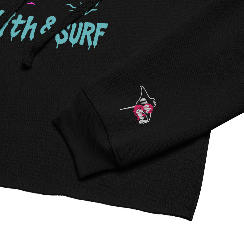 "Inked" cropped hoodie sleeve cuff detail in black showing embroidered pink "17th & Surf" stingray logo – 17th & Surf