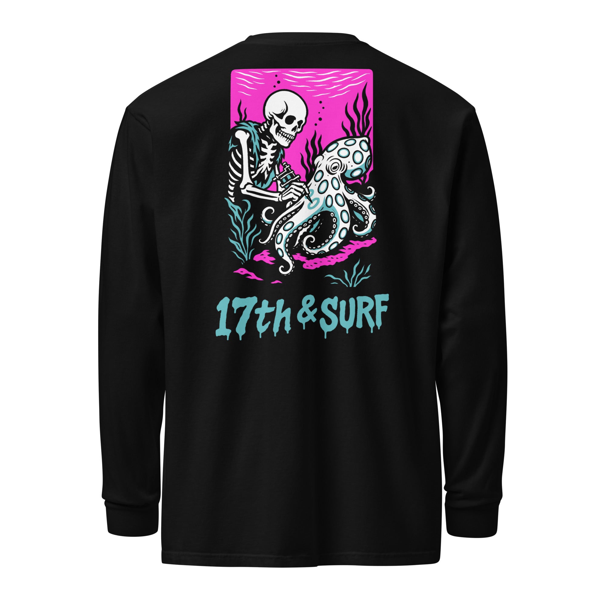 "Inked" garment-dyed heavyweight long sleeve back flat lay in black featuring skeleton tattooing an octopus graphic with "17th & Surf" text on pink background – 17th & Surf