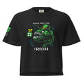 "Kiss Me I'm Irish" Anglerfish black heavyweight boxy tee, front flat lay, featuring the green leprechaun anglerfish with shamrock lure and "KISS ME I'M IRISH" text, plus a dripping-lips "17TH & SURF" sleeve logo – 17th & Surf