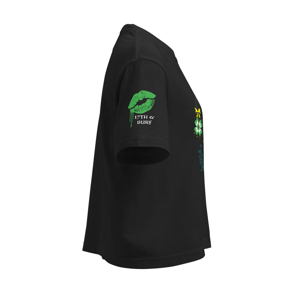 "Kiss Me I'm Irish" Anglerfish black heavyweight boxy tee, side profile flat lay highlighting the green dripping-lips "17TH & SURF" sleeve logo alongside the anglerfish design – 17th & Surf