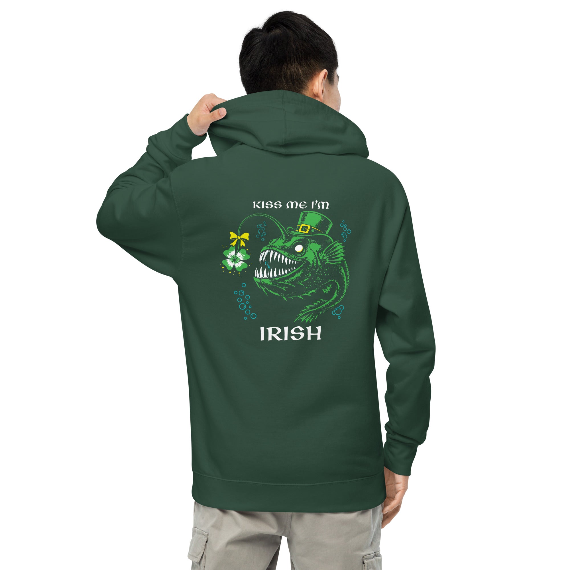 "Kiss Me I'm Irish" Anglerfish alpine green midweight hoodie on male model, back view, featuring the green leprechaun anglerfish with shamrock lure and "KISS ME I'M IRISH" text – 17th & Surf