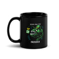 "Kiss Me I'm Irish" Anglerfish black glossy 11oz mug, handle on left, featuring the green leprechaun anglerfish with shamrock lure and "KISS ME I'M IRISH" text – 17th & Surf