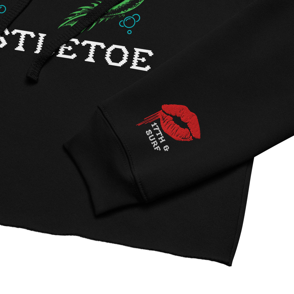 "Mistletoe" Anglerfish black cropped hoodie, close-up detail of the dripping red lips "17th & Surf" embroidered sleeve cuff logo – 17th & Surf