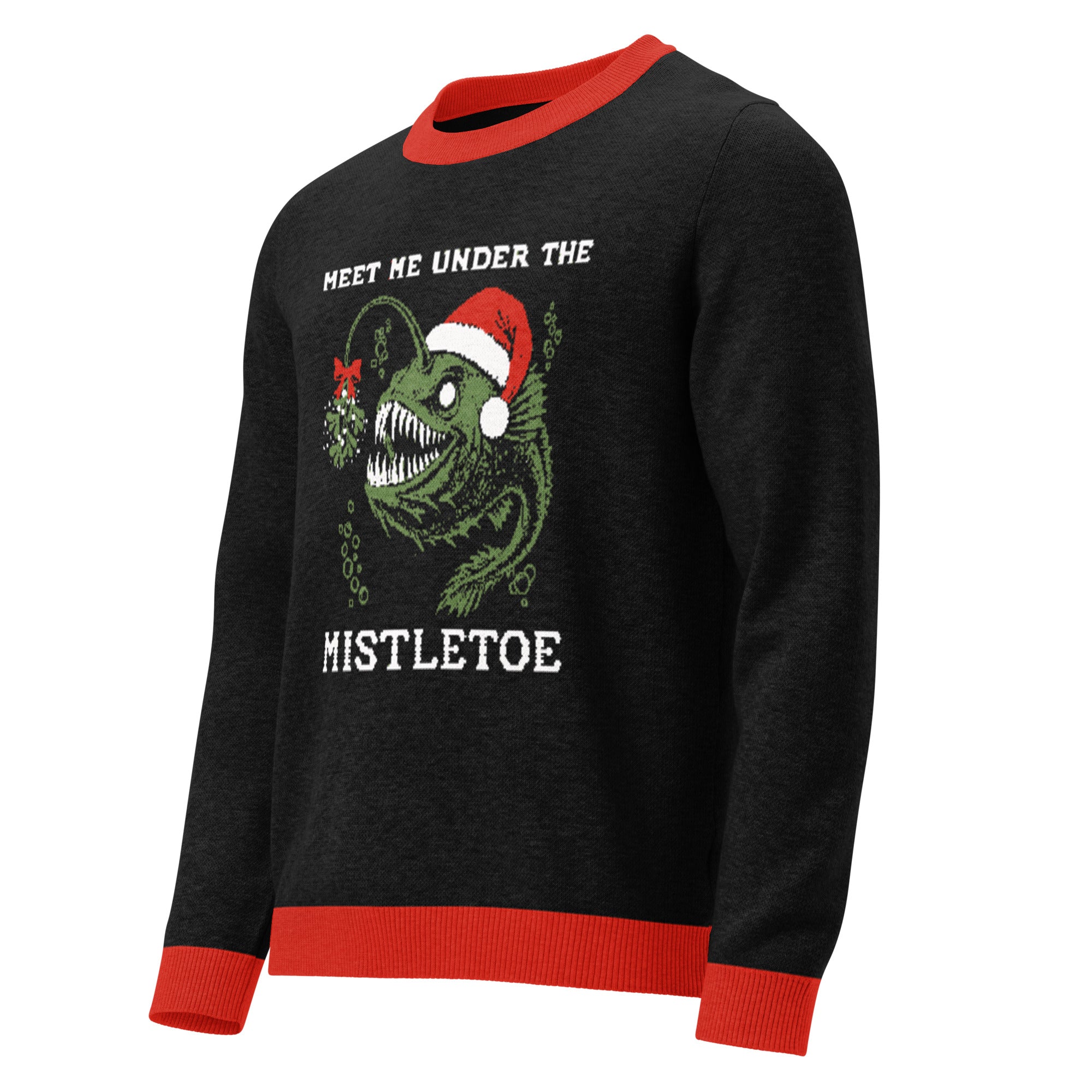 "Mistletoe" Anglerfish charcoal knitted Christmas sweater with red ribbed trim, 3/4 angle flat lay, featuring the "Meet Me Under The Mistletoe" anglerfish graphic – 17th & Surf