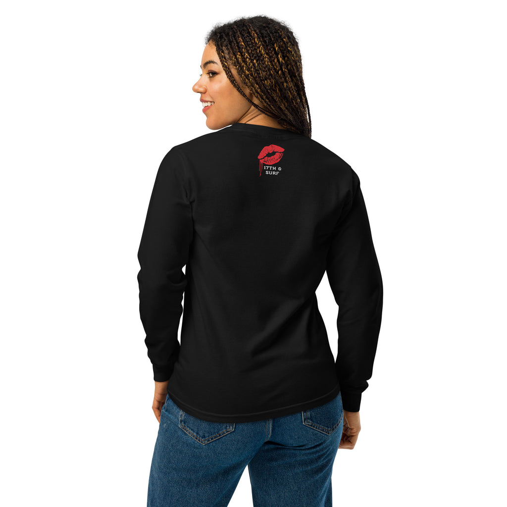 "Mistletoe" Anglerfish black heavyweight long sleeve shirt on female model, back view, featuring the dripping red lips "17th & Surf" collar logo – 17th & Surf