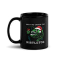 "Mistletoe" Anglerfish black glossy 11oz mug, handle on left, featuring the "Meet Me Under The Mistletoe" anglerfish wearing a Santa hat with a mistletoe lure – 17th & Surf