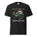 "Mistletoe" Anglerfish black heavyweight t-shirt, front flat lay, featuring a green anglerfish wearing a Santa hat with a mistletoe lure and "Meet Me Under The Mistletoe" graphic – 17th & Surf