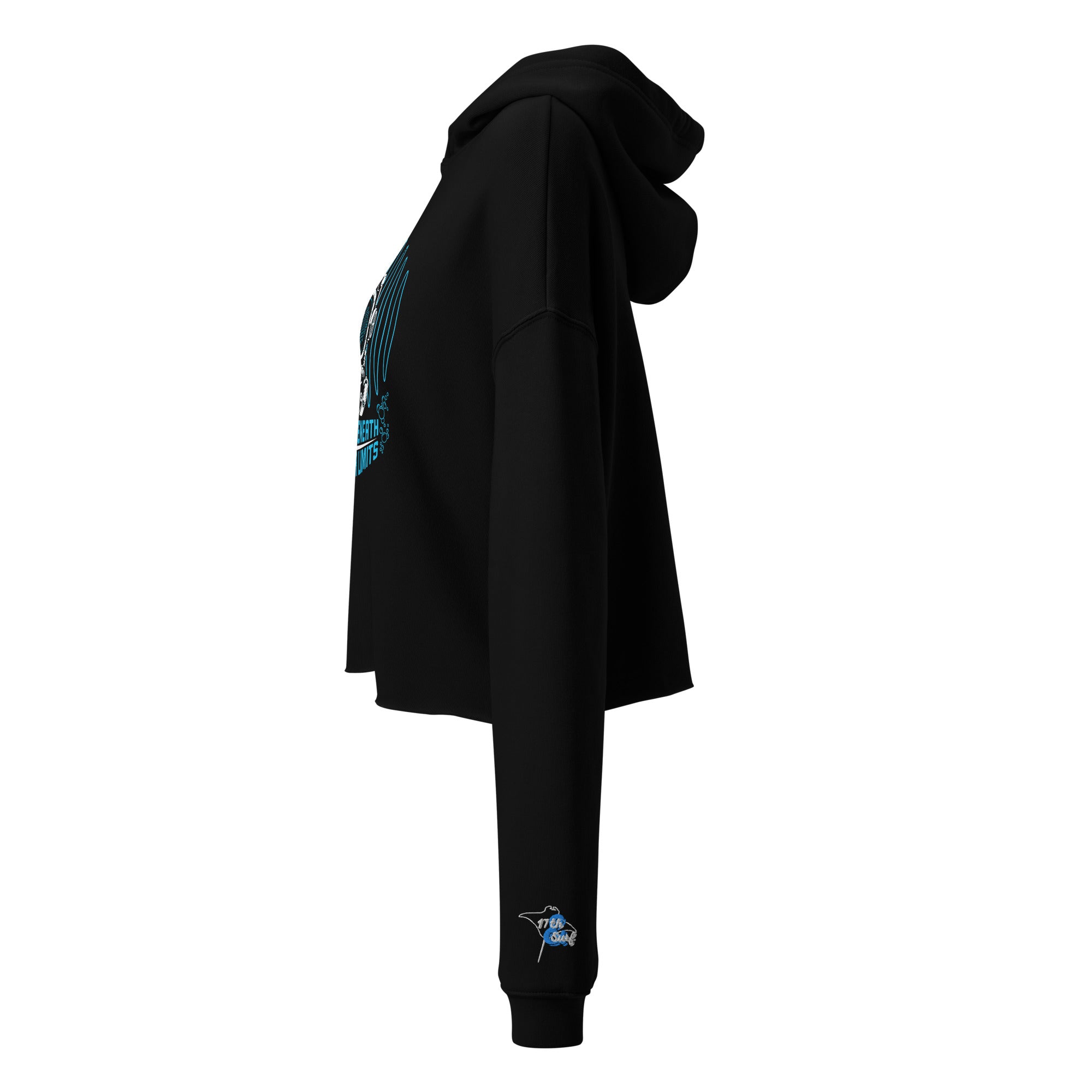 "Beneath The Outer Limits" women's cropped hoodie in black, side flat lay, featuring the large diving-helmet graphic on front and the small embroidered "17th & Surf" manta ray and surfboard logo on the cuff – "Beneath The Outer Limits" Series by 17th & Surf