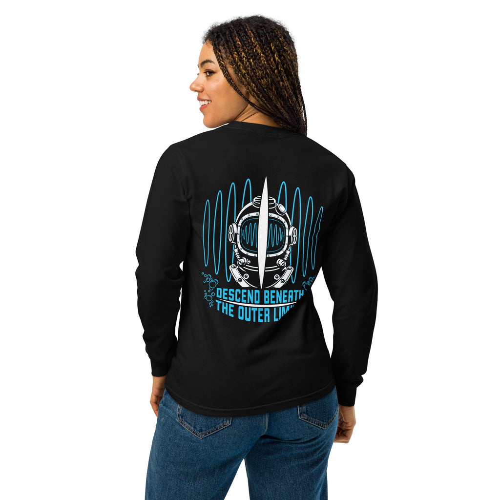 "Beneath The Outer Limits" garment-dyed heavyweight long sleeve shirt in black, back view on female model, featuring the large graphic of a vintage diving helmet split by a surfboard fin, framed by blue broadcast test-pattern rings, with the text "DESCEND BENEATH THE OUTER LIMITS" – "Beneath The Outer Limits" Series by 17th & Surf
