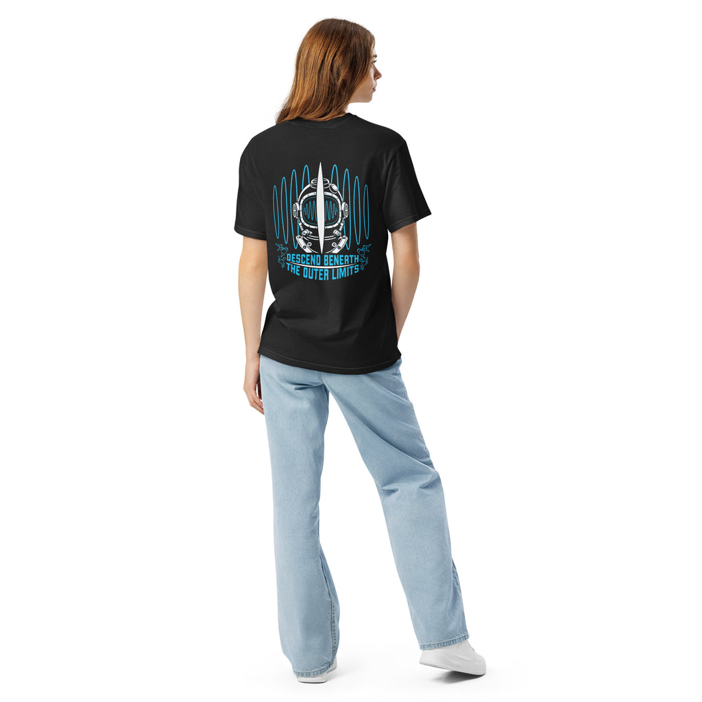 "Beneath The Outer Limits" garment-dyed heavyweight tee, back view on female model, featuring the large graphic of a vintage diving helmet split by a surfboard fin, framed by blue broadcast test-pattern rings, with the text "DESCEND BENEATH THE OUTER LIMITS" – "Beneath The Outer Limits" Series by 17th & Surf