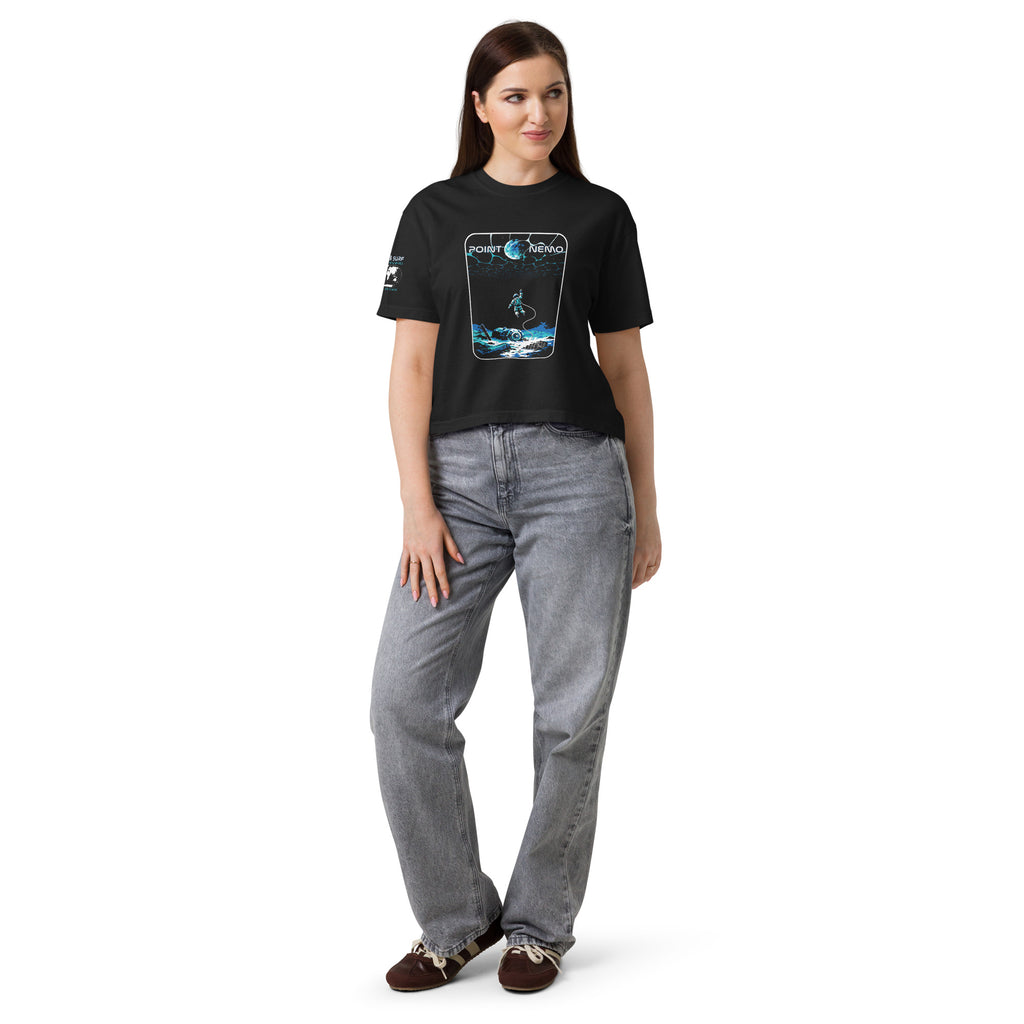 "Point Nemo" women's heavyweight boxy tee, front view on female model, featuring the large "Point Nemo" astronaut and sunken satellite wreckage graphic on the chest – "Haunted Seas" Series by 17th & Surf
