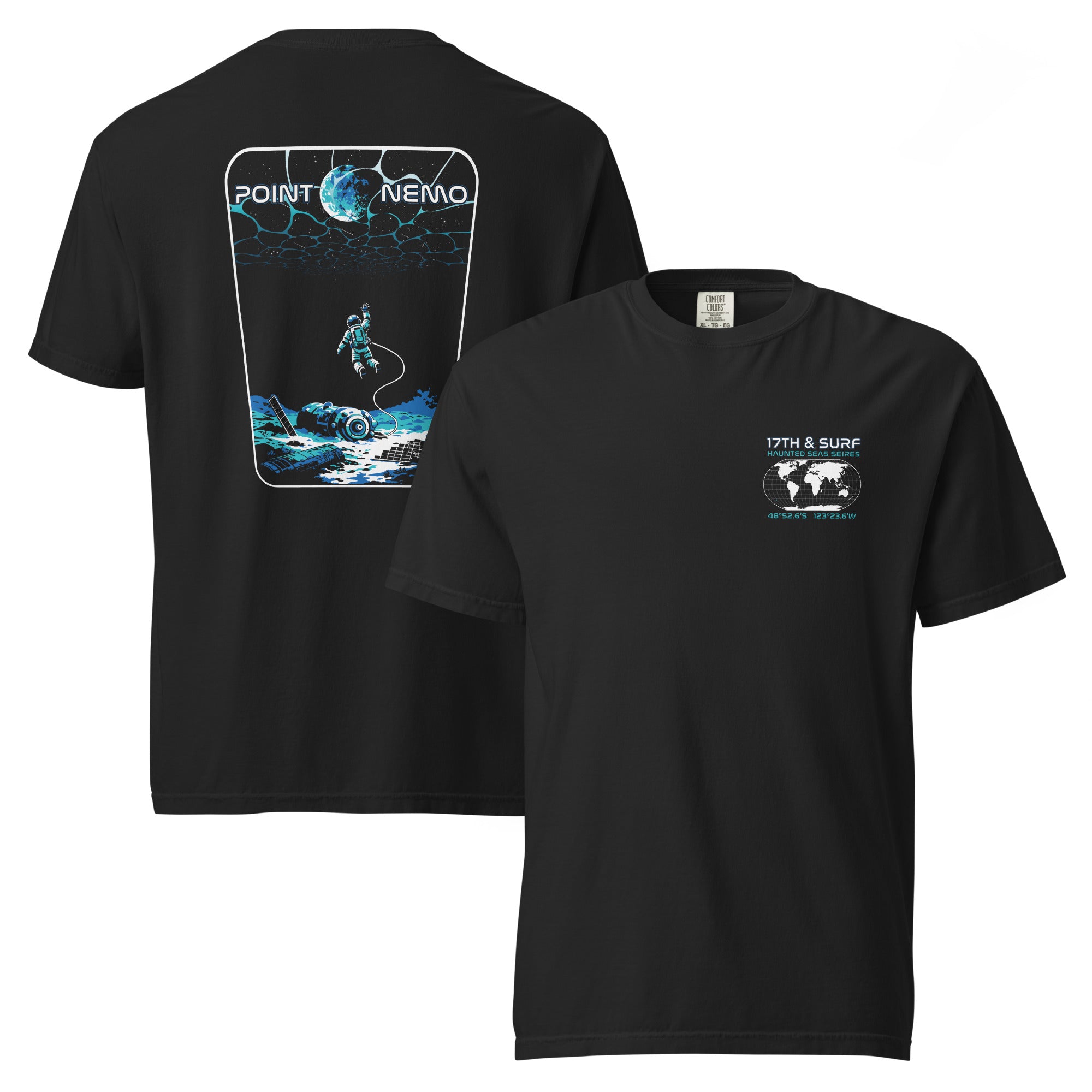 "Point Nemo" garment-dyed heavyweight tee, front and back flat lay, featuring the small Haunted Seas Series world map patch with coordinates 48°52.6'S 123°23.6'W on the chest and the large "Point Nemo" astronaut and sunken satellite wreckage graphic on the back – "Haunted Seas" Series by 17th & Surf