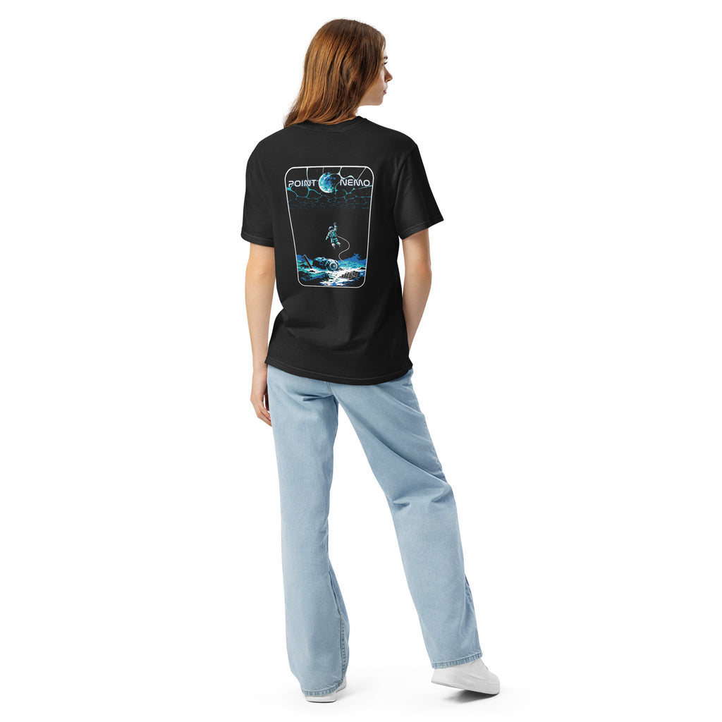 "Point Nemo" garment-dyed heavyweight tee, back view on female model, featuring the large "Point Nemo" astronaut and sunken satellite wreckage graphic across the back – "Haunted Seas" Series by 17th & Surf