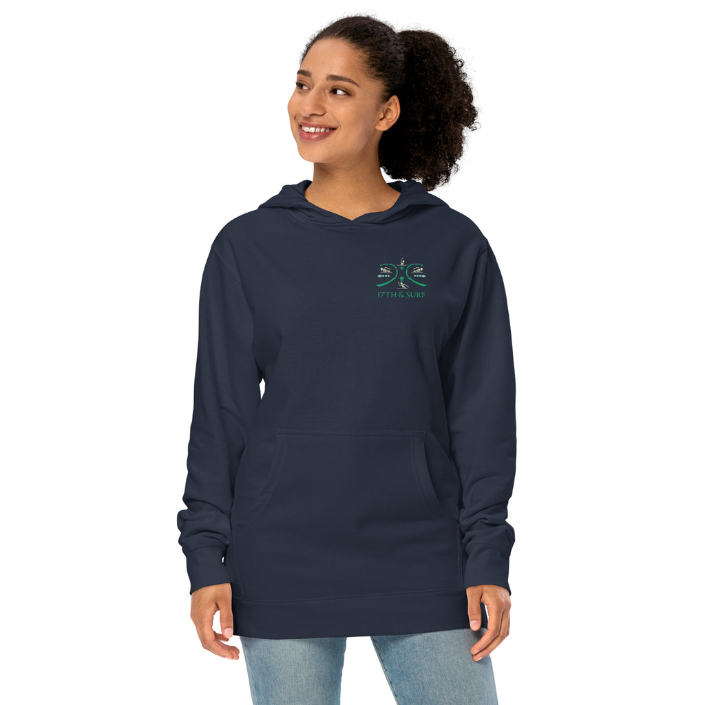 Model wearing "RIP Current" garment-dyed heavyweight hoodie in classic navy with small "17TH & SURF" emblem chest logo – 17th & Surf
