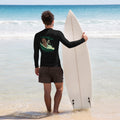 "RIP Current" black rash guard, back surfer model view, featuring the skeleton surfing a "RIP" tombstone through a wave, with "I Rode the RIP Current" text graphic – 17th & Surf