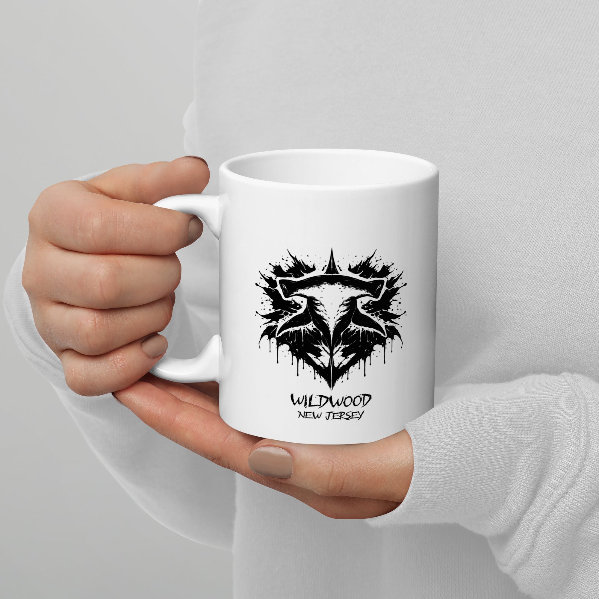 Rorschach Series Hammerhead 11oz white glossy mug back view with handle on left, featuring black Rorschach ink-blot hammerhead shark design with "Wildwood New Jersey" text – 17th & Surf