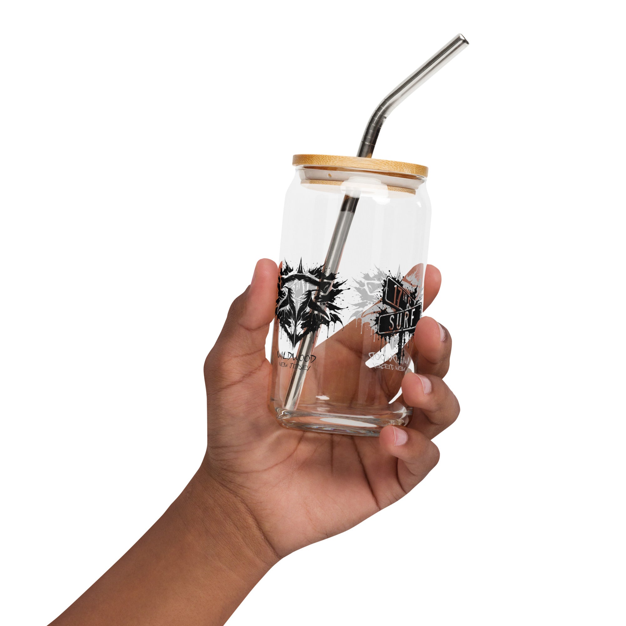 Rorschach Series Hammerhead 16oz clear glass can with bamboo lid and straw, left angle view featuring both the Wildwood hammerhead design and "17th & Surf" street sign logo – 17th & Surf