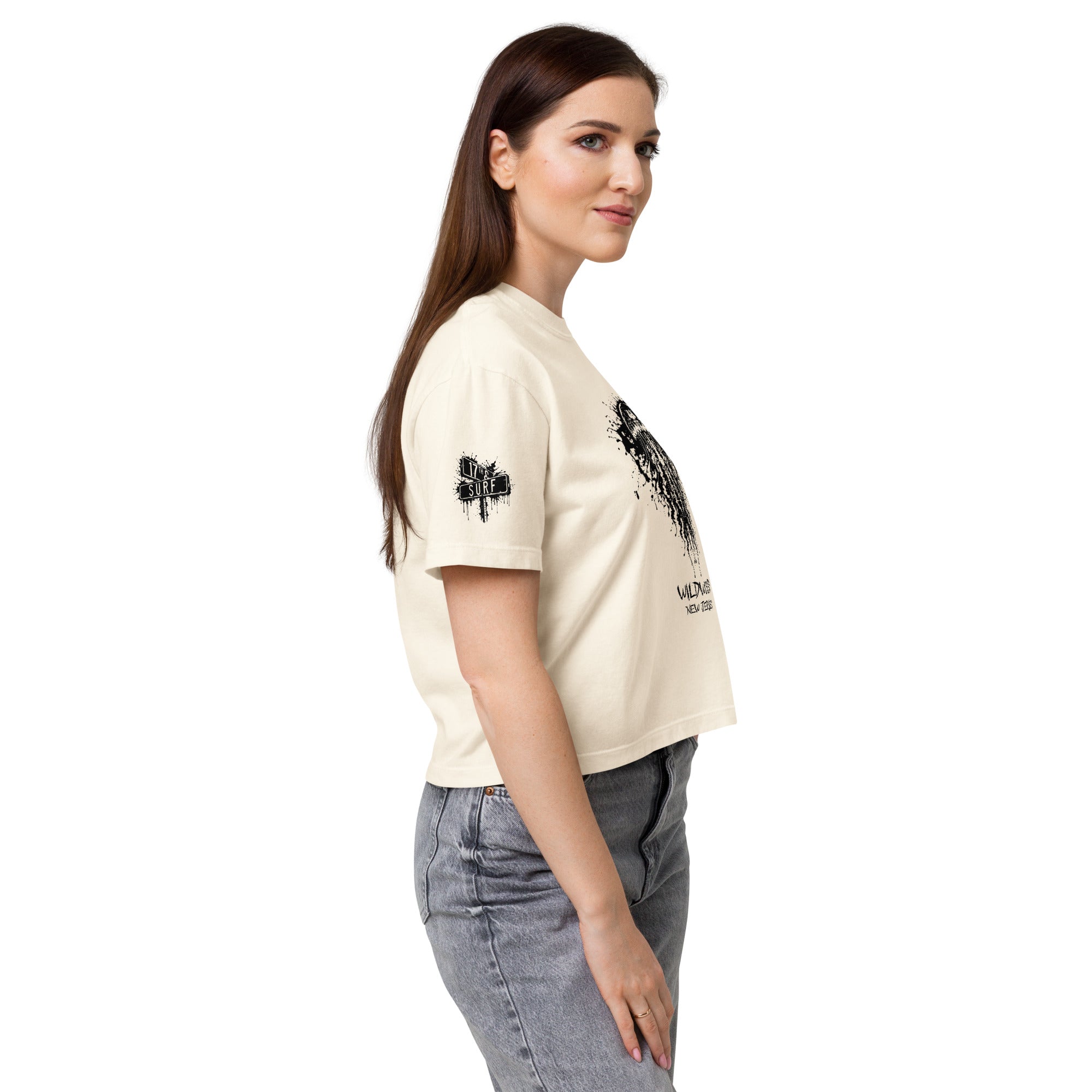 Rorschach Series Jellyfish women's heavyweight boxy t-shirt side view on model in ivory showing small "17th & Surf" street sign sleeve logo and black Rorschach ink-blot jellyfish design wrapping to the side – 17th & Surf