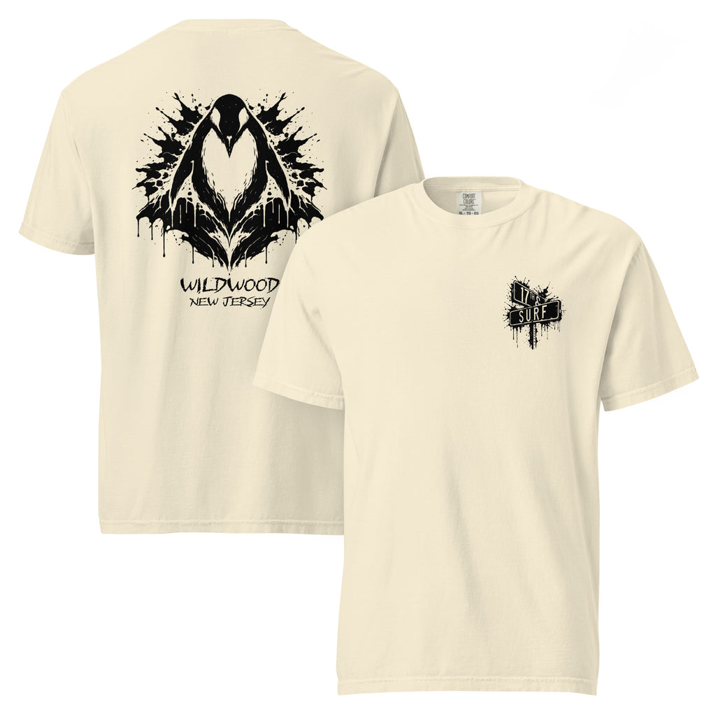 Rorschach Series Penguin garment-dyed heavyweight tee flat lay in ivory showing both the black Rorschach ink-blot penguin "Wildwood New Jersey" back design and "17th & Surf" street sign front logo – 17th & Surf